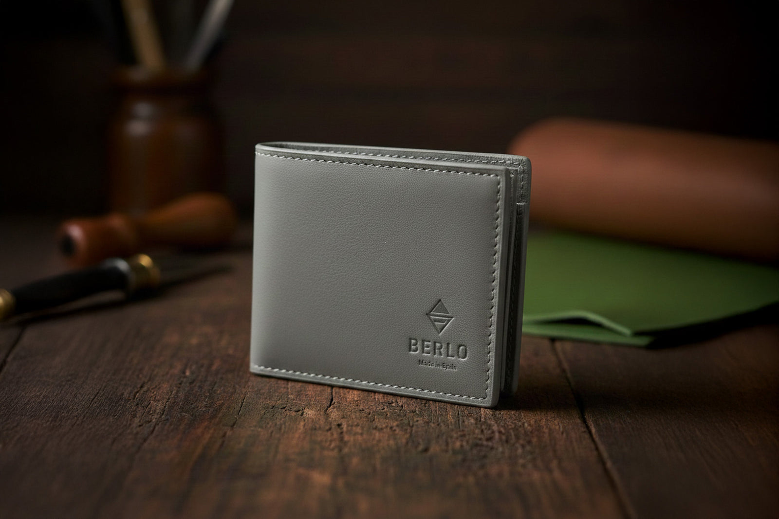 Berlo cactus-leather wallet presented as a premium object under soft, directional light.
